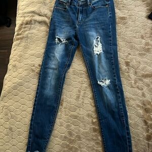 K’s More brand. Dark wash blue jeans in good condition. Size 5. Skinny jeans.